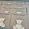 2026/03/84564-scaled.jpg wooden worry bear